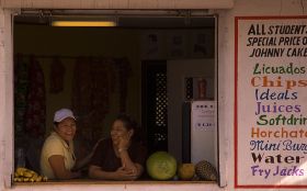 women at food stand, San Pedro, Ambergris Caye, Belize – Best Places In The World To Retire – International Living